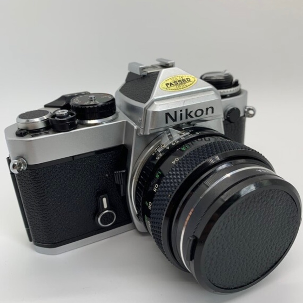 Nikon FE with 28mm f/2.5 Soligor Wide-Auto Lens and 52mm and Nikon Flash
